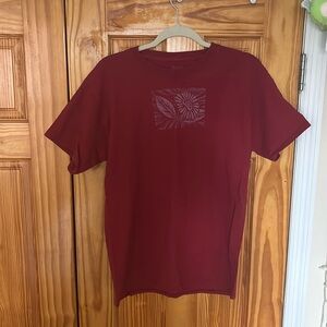 Red hanes t shirt with screen printed flower graphic